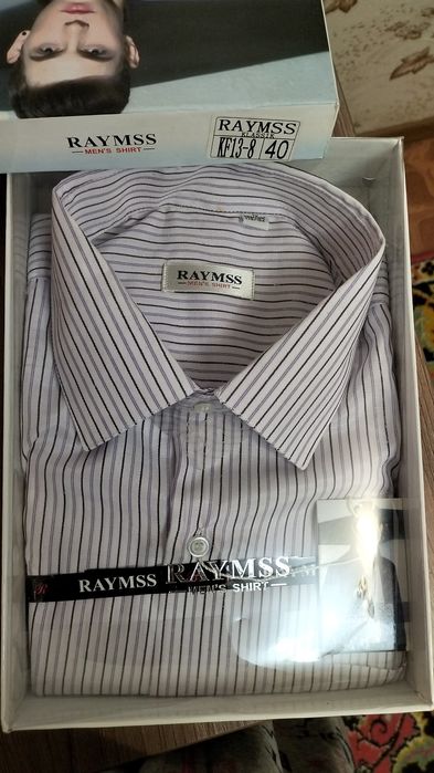 Рубашки мужские новые