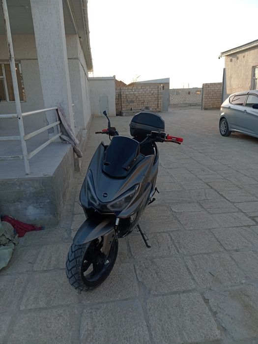 Макси Мапед сызылған жері бар