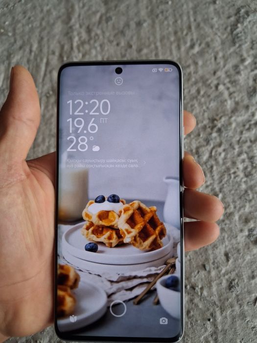 Xiaomi HyperOS ..