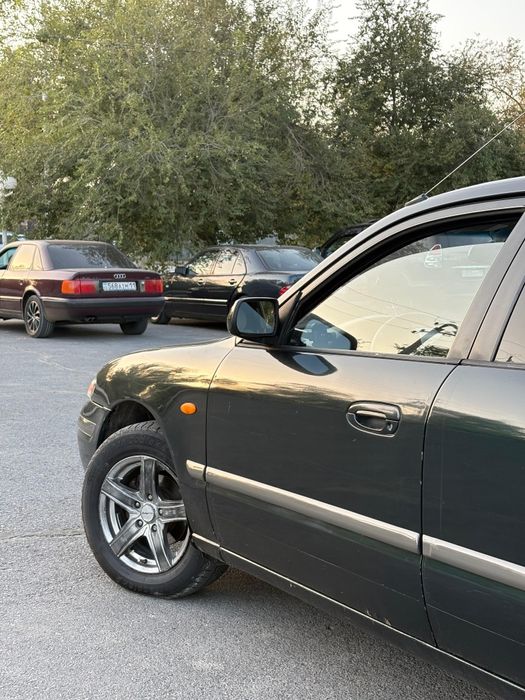 Мазда 626 птичка