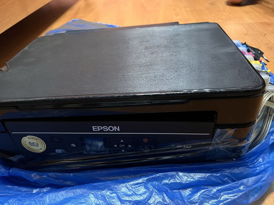 Принтер EPSON, работает, но вылетела программа. Цена 10000 тенге…………..