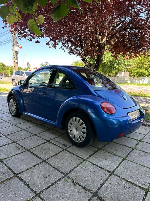 VW Beetle - 1.6 benzina - 102 CP - 178k Km - E4 - AC - Incalzire scaune - Geamuri si oglinzi electrice - Inchidere centralizata - 2002