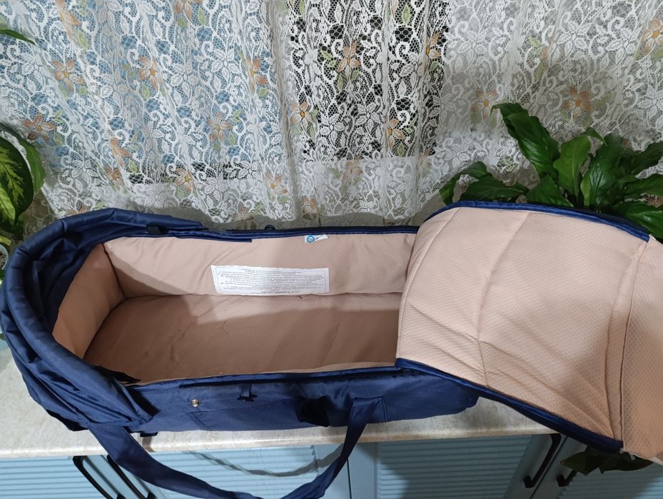 Детская переноска фирмы Chicco