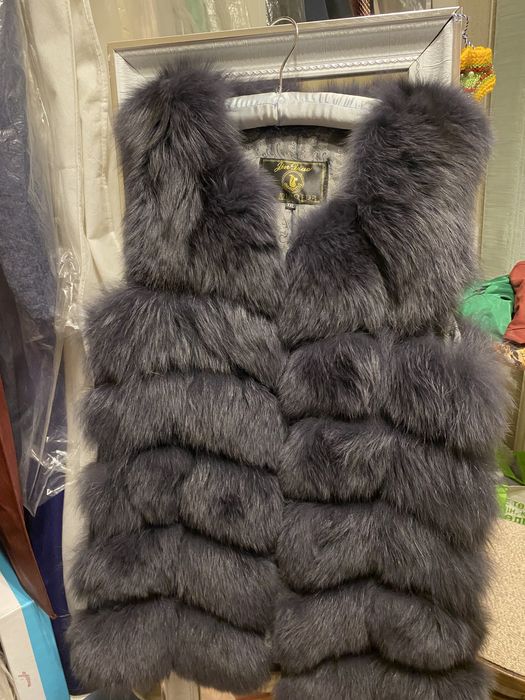 Меховая жилетка