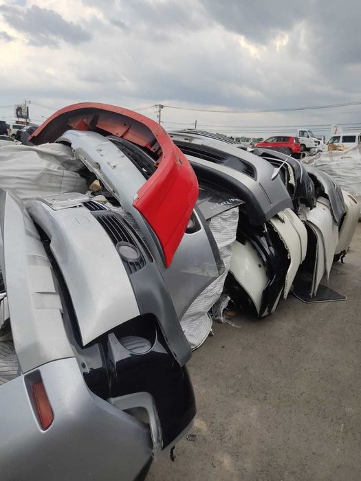 Передний бампер  оригинальный ассортимент