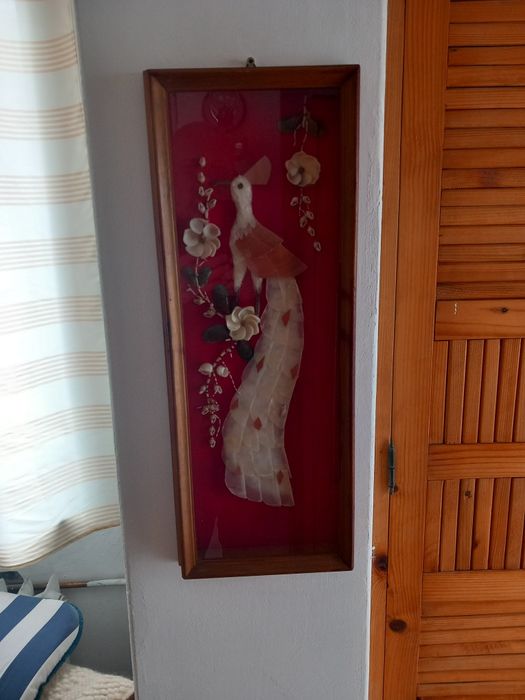 Aranjament sub formă de păun din scoici