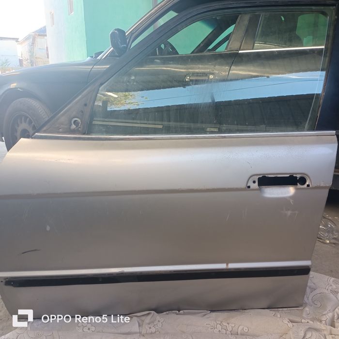 Продам шына новый и дверь BMW e-34