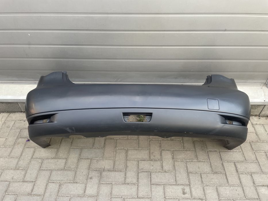 Задний бампер Almera G15