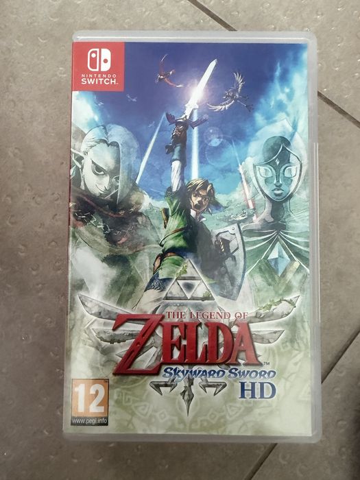 Комплект Nintendo Switch OLED с калъф The Legend of Zelda и 7 игри