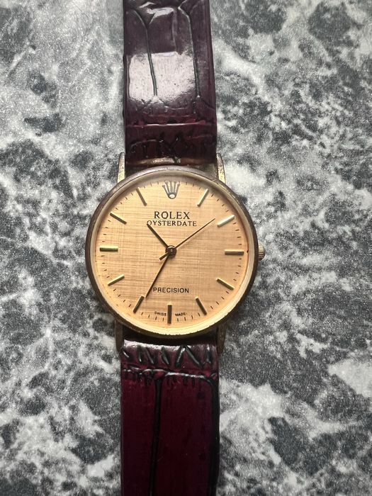 Часовници Omega и Rolex