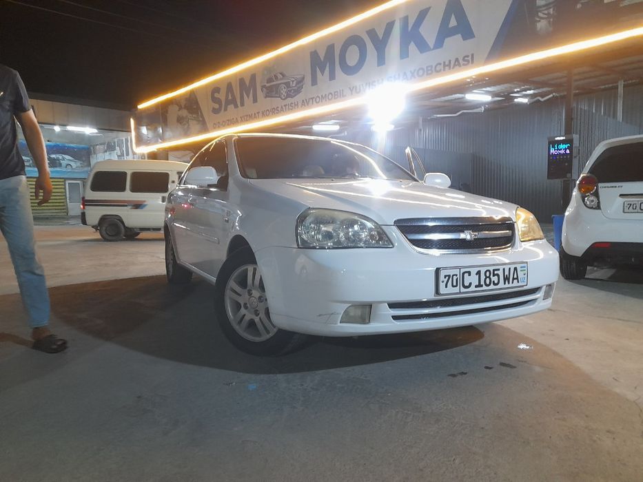 Ласетти 2011.  2 позится