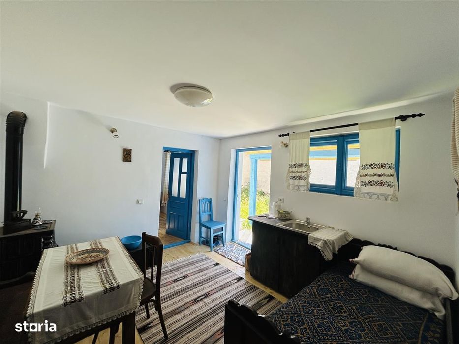 Casa individuala cu 2 corpuri de cladire si teren 625 mp