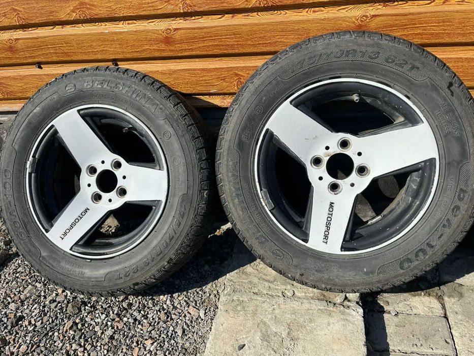 Продам комплект резины с дисками (титаны)