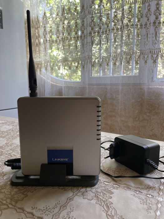 Продам модем Linksys