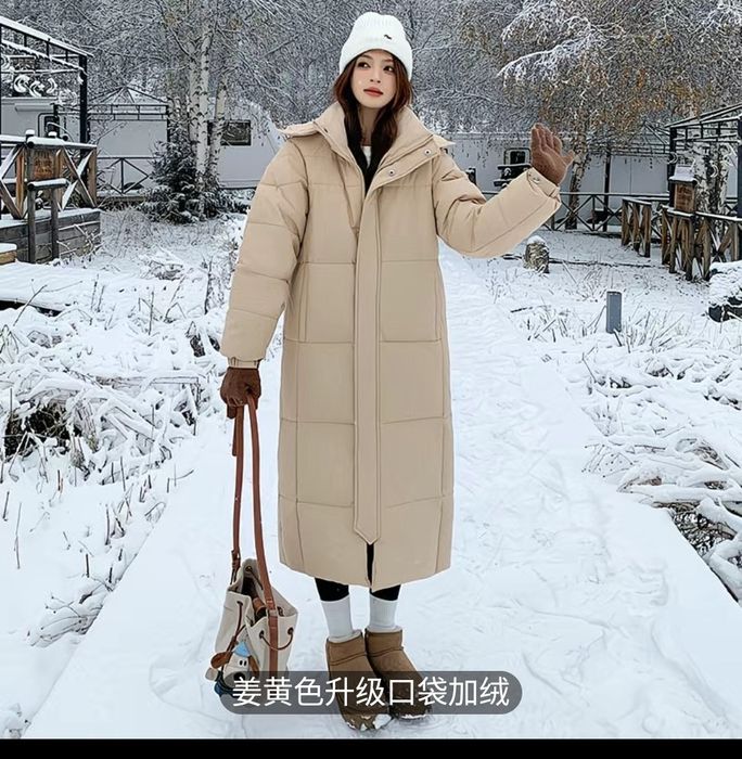 Продам пуховик длинный