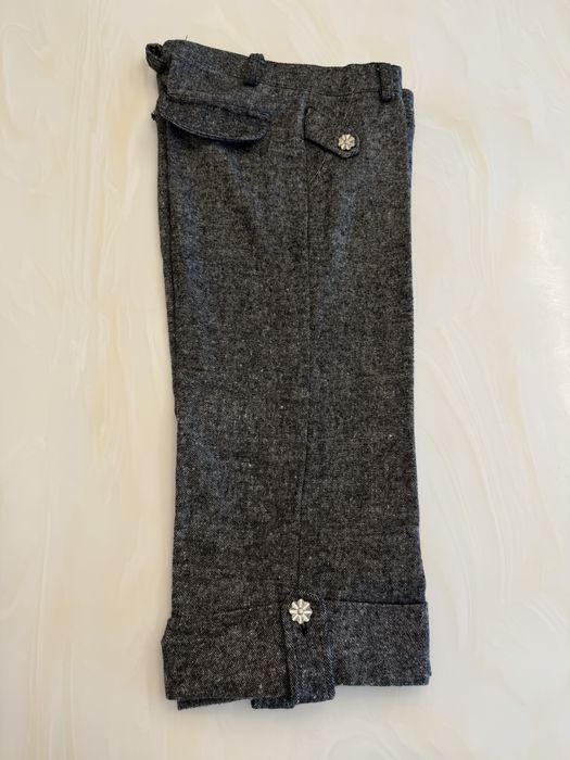 Pantaloni trei sferturi