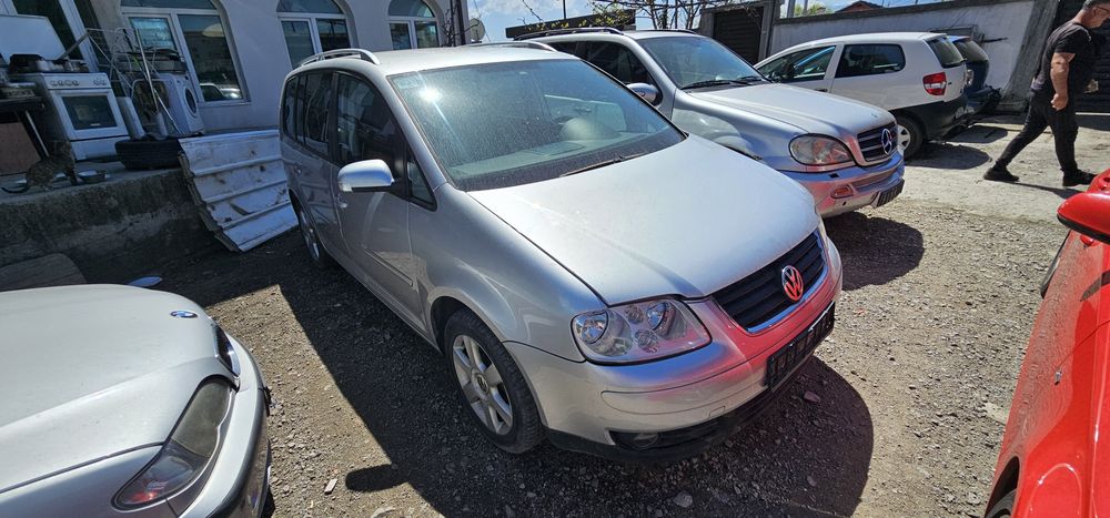 На части VW Touran 2.0