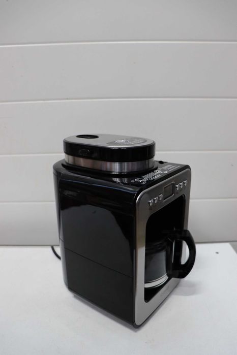 Компактна шварц кафемашина CASO Coffee с мелачка, 4 чаши кафе, подходяща и за предварително смляно кафе, LCD дисплей, таймер