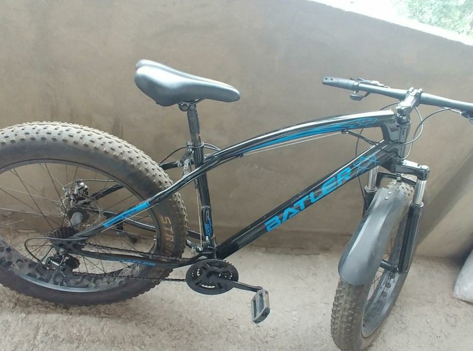 Велосипед - фэтбайк.