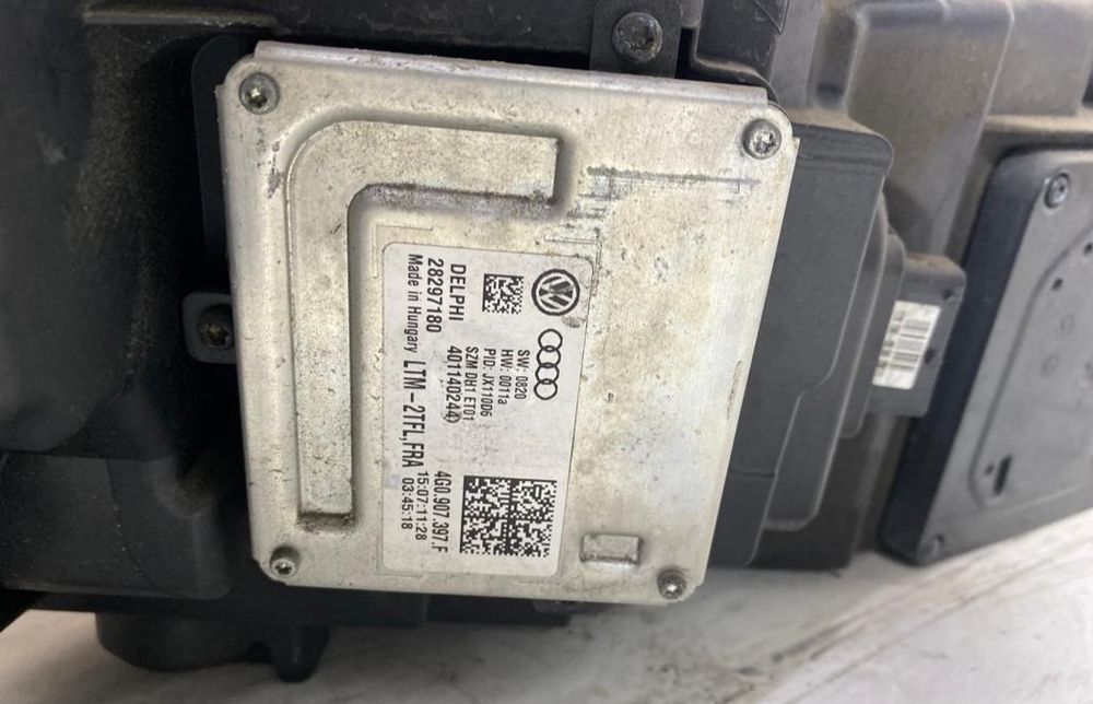 Привозные фары на Audi A6C7