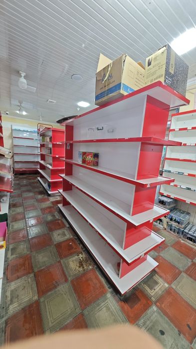 Срочно продаётся двухсторонний стеллаж, (полка)