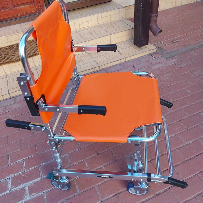 Scaun/carucior cu rotile, pliabil, pentru transport persoane cu dizabilitati