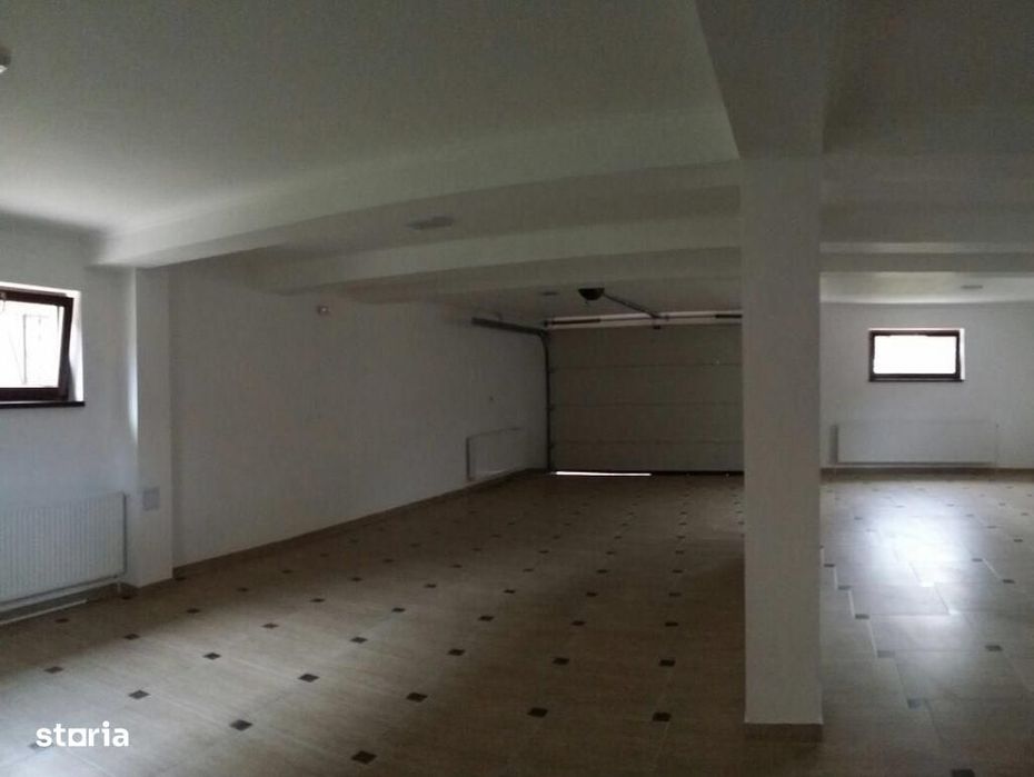 Casa individuala cu 5 camere, demisol cu garaj.