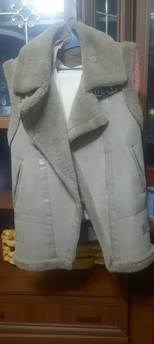 Безрукавка теплая
