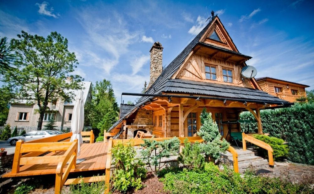 Case,cabane din lemn rotund bustean