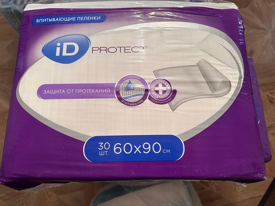 Продам памперсы с пеленками