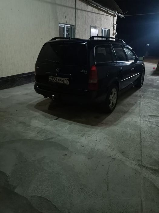 Машина Opel-Astra G