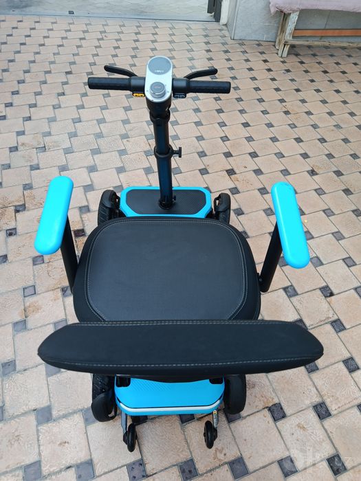 Oʻrindiqli 4 gʻildirakli elektr skuter