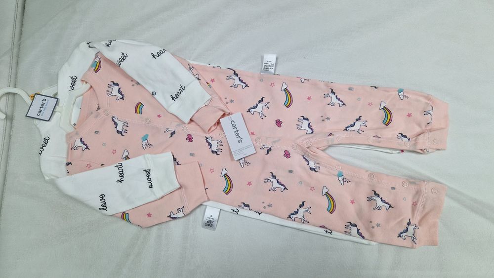 Комплект детских слипов от Carter's.