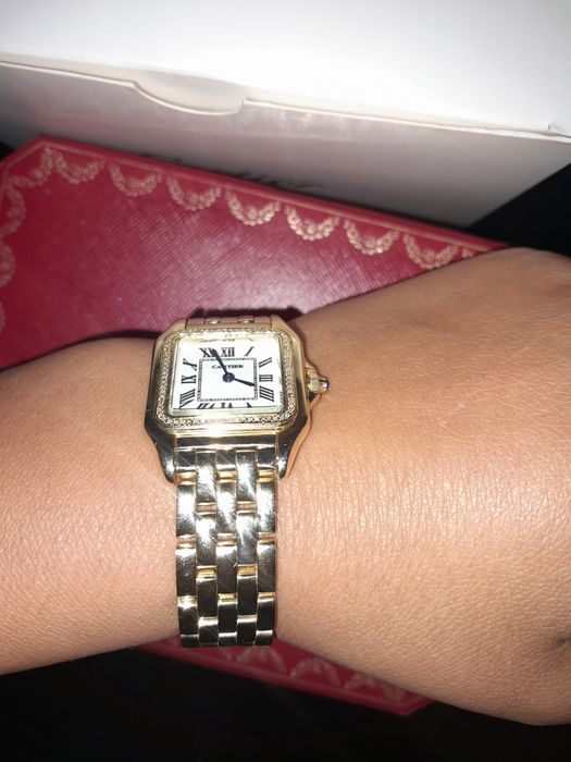 Продам золотые часы.