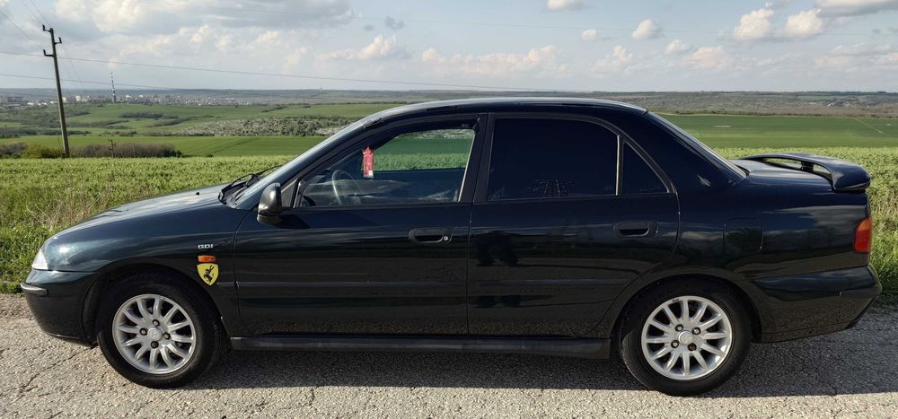 Продавам автомобил Mitsubishi Carisma