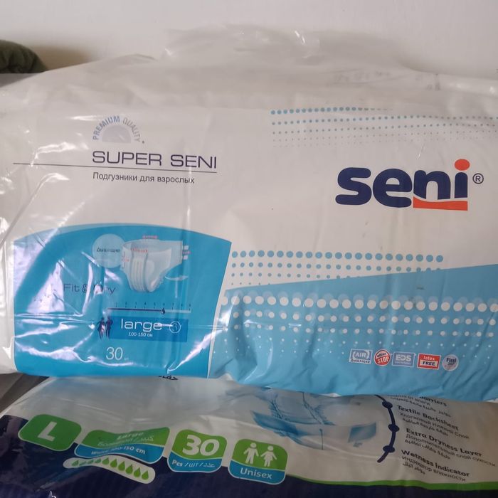 Продам памперсы. Размер л