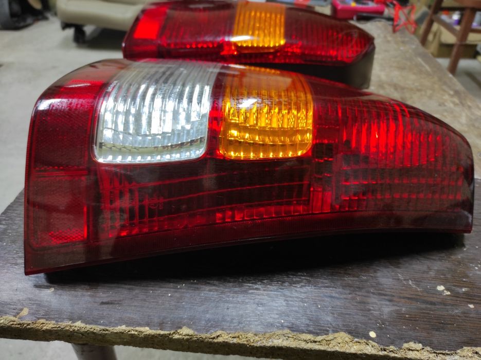 Фонарь задний правый левый Мазда Трибут