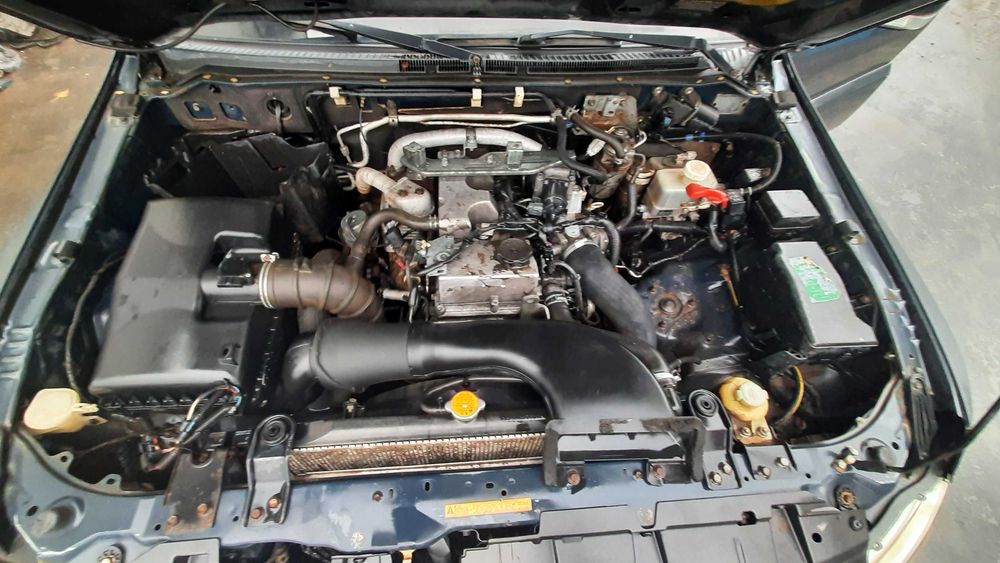 Dezmembrez mitsubishi pajero IV 3.2 DI-D TIP 4M41/bara fata/capota/far
