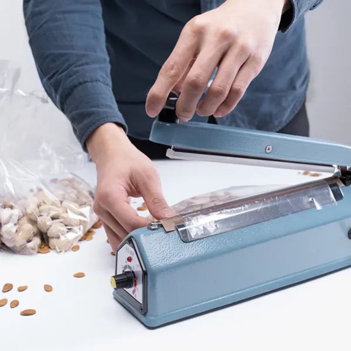 Салафан дазмол, запайщик пакетов, салафан пайка, утюг