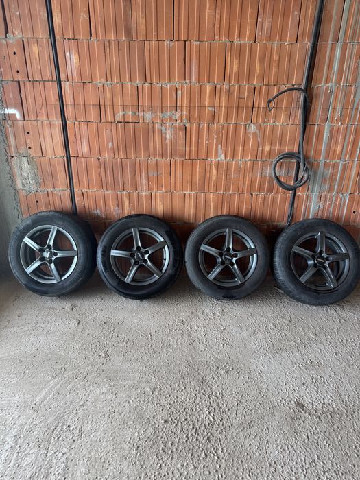 Set 4 jante aliaj Alutec 15" + anvelope vară Yokohama BluEarth 195/65 R15