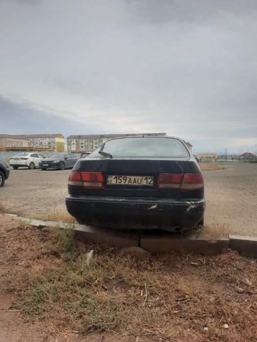 Тойота карина е 1.6