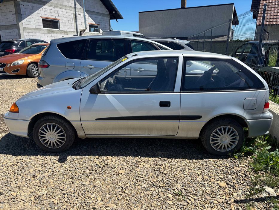 Suzuki Swift 2003 automata, clima