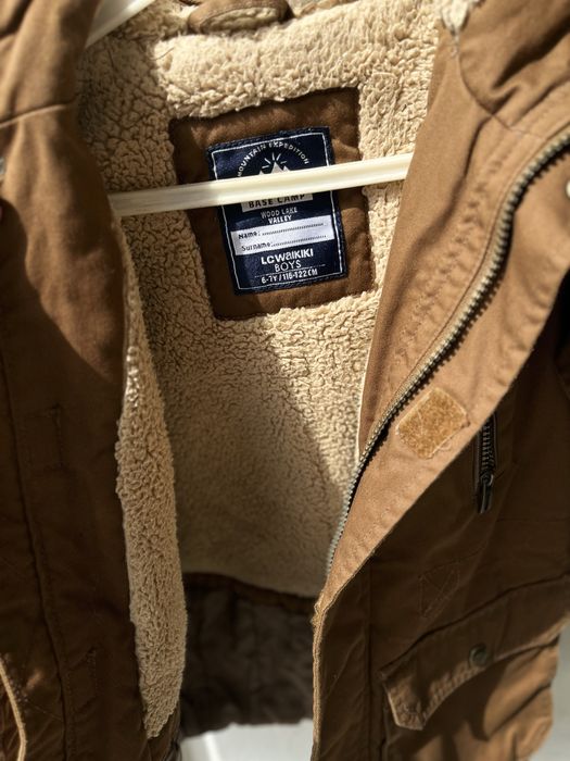 Продам теплую детсую шубку! Парку.