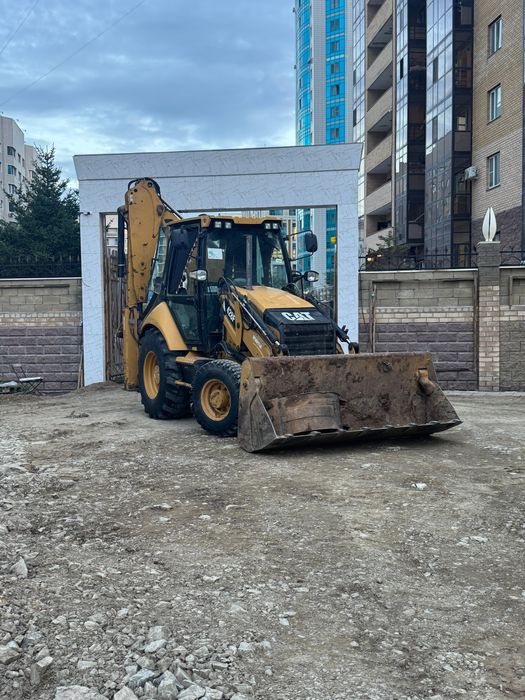 Услуги экскаватора и погрузчика