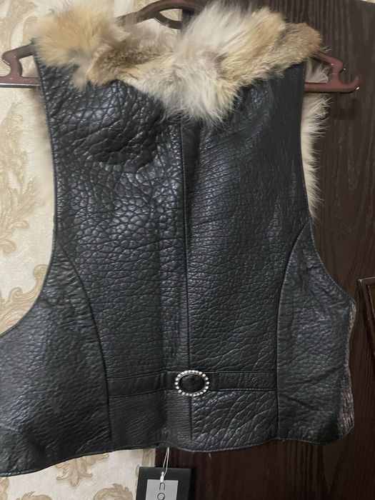 Жилетки разные в отличном состоянии