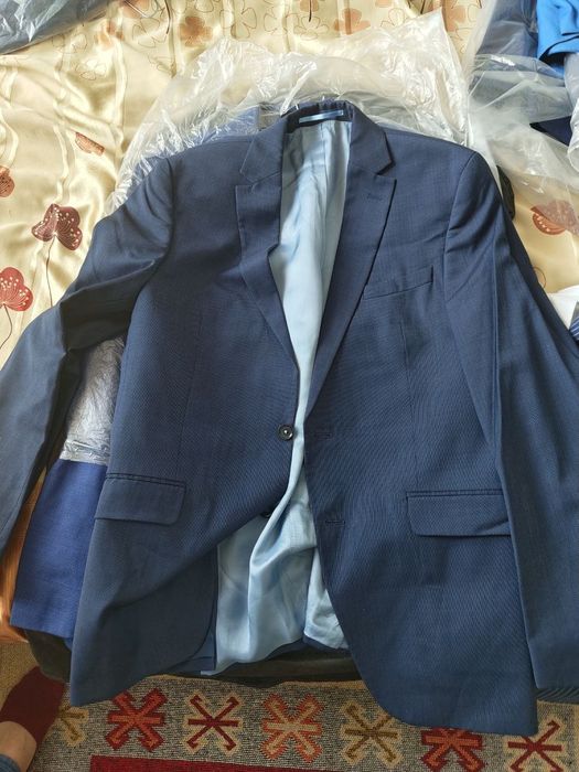 Мужские костюмы б/у