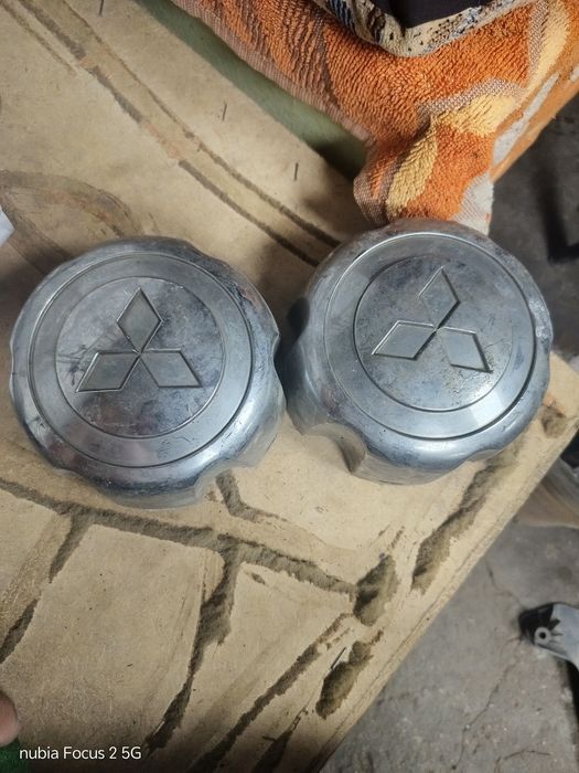 Продам центральные колпаки ММС