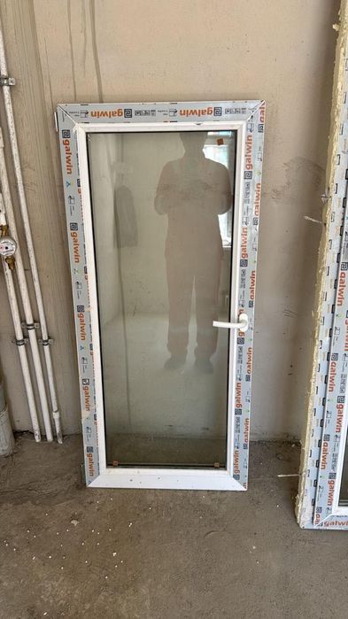 Пластиковые окно с дверью на балкон