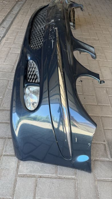 Передний бампер Mercedes W211