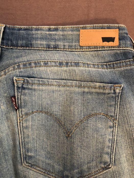 Blugi Levi’s demi mid curve 28